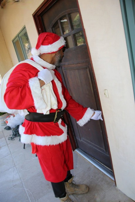 Cute blonde Tanner Mayes eats cum covered cookies after blowing Santa's dick