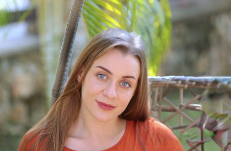 Gorgeous amateur teen Josephine C exposes her incredible bosom in the backyard