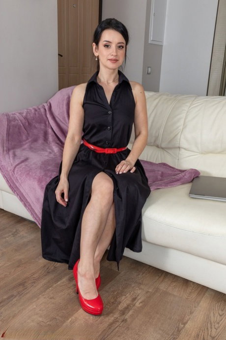 Mature goddess Britney I takes off her sexy black dress & high heels