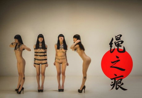 Naked Japanese female Carmine Worx is restrained with her arms to her side
