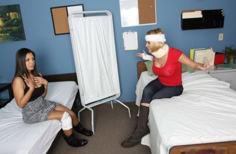 Horny big titted ladies share big cock and a strap-on dick in the hospital