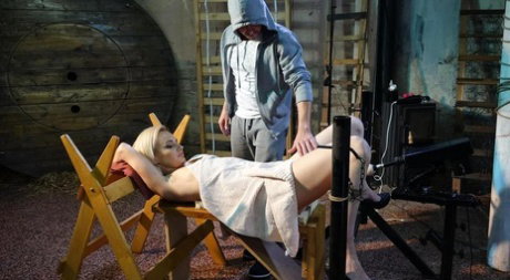 Thin fetish model Roxy Lee gets fucked by a machine against her will