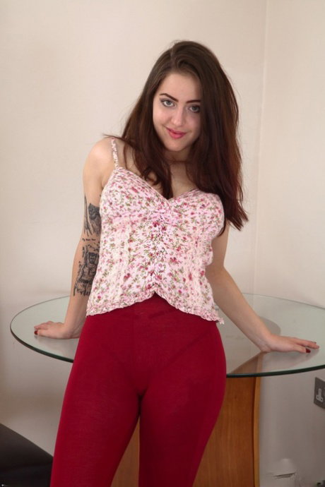 Amateur brunette Rabiosa reveals her bush and teases with her pierced nips
