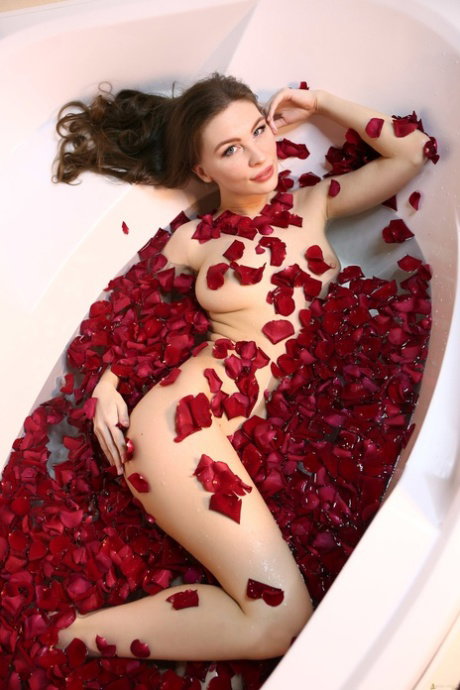 Erotic brunette with big boobs Cecelia takes a flower petal bath
