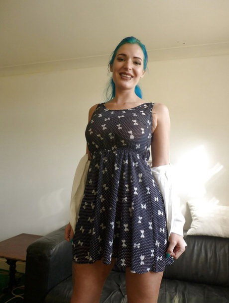 European amateur showing off tattooed body after undressing
