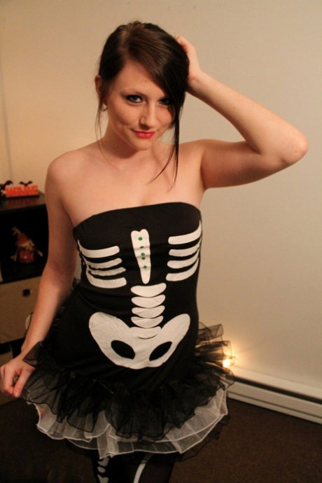 Amateur girl Freckles 18 covers her bare boobs in her Halloween outfit