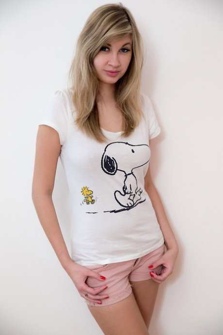 Sexy beautiful teen Holy removes shorts and t-shirt to toy horny little pussy