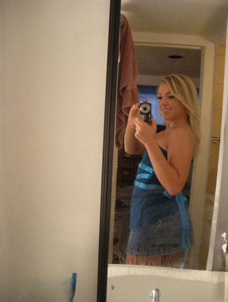 American blonde with natural tits named Ally Kay masturbates at home