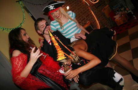 College students participate in group sex during a Halloween party