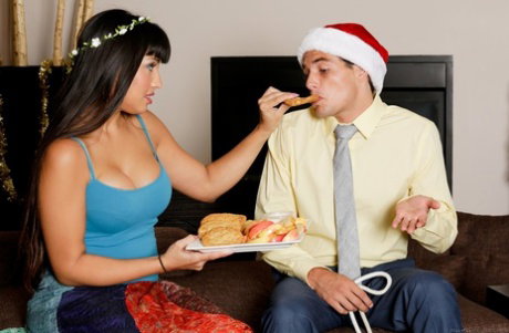 Latina MILF Mercedes Carrera feeds a boy before giving him a nuru massage