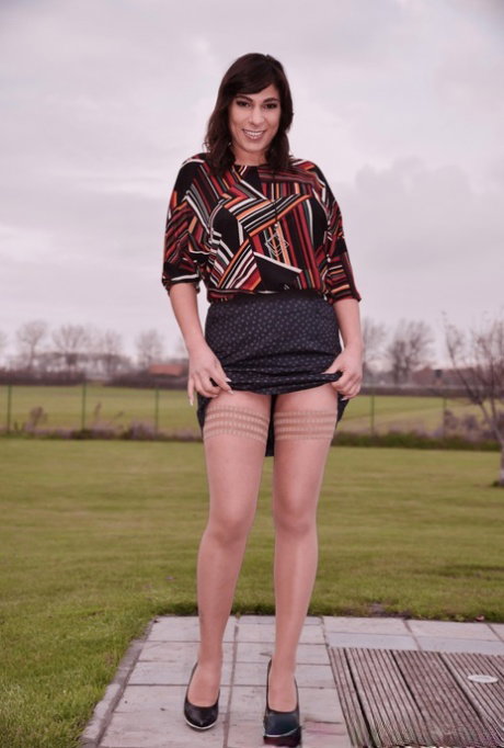 Sexy brunette Farah changes her footwear and lingerie during a solo engagement