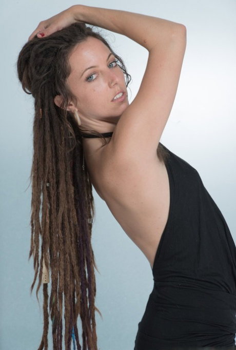 Cutie with dreadlocks Jazmine Skye fingers her hairy bush after striptease