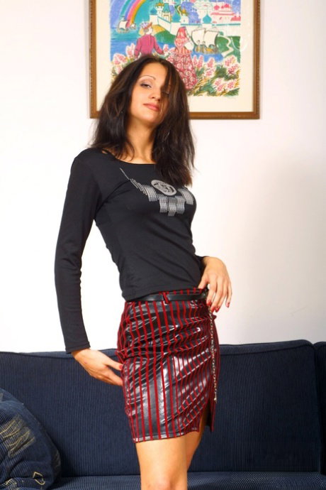 Slim babe Karry loses her blouse and undies to stuff her clam with a toy