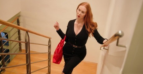 Fair skinned redhead Lenina Crowne engages in foreplay with her lover