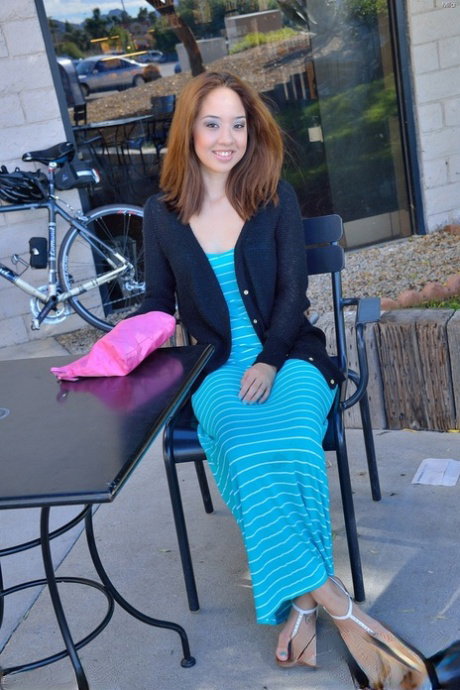 Naughty redhead girl bares her small nipples & lifts long dress in public