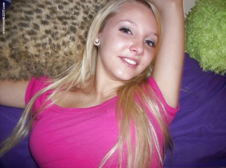 Desirable barely legal chick Elle teases by flashing her shaved pussy