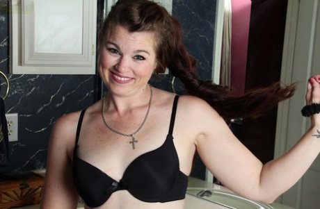 Yummy milf Alixx Smith with tiny tits and shaved pussy in the bathroom