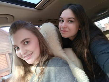 Long haired European lovers take a selfie in the car before lesbian sex action