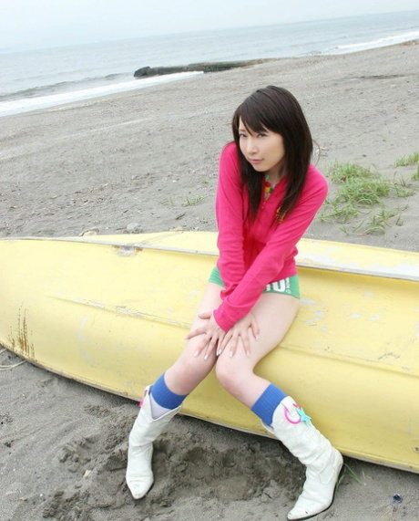 Japanese teen Jidu plays with her nice tits before showing her trimmed pussy