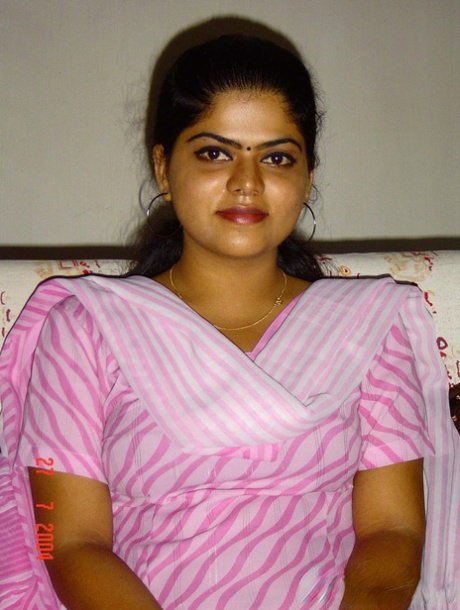 Indian girl Neha sets her natural boobs free of a black brassiere