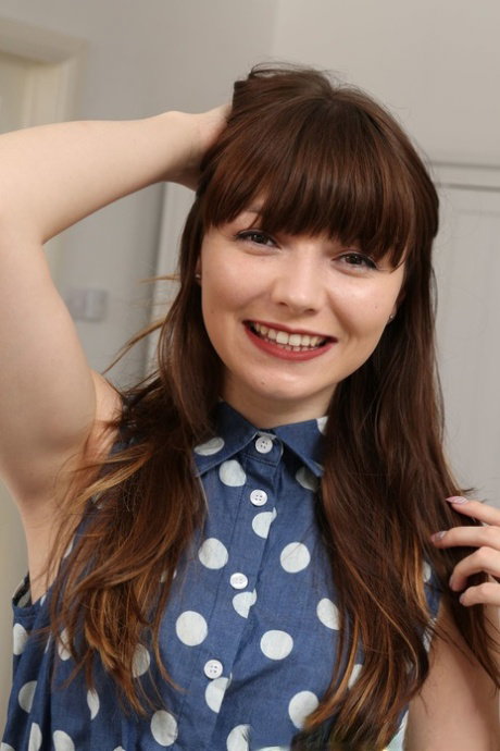 Teen Helen G strips her dotted dress & poses in black lingerie & red undies