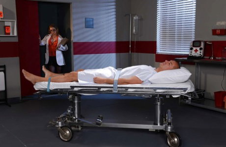 Nerdy doctor Sunny Lane takes cumshot on face from patient in hospital room