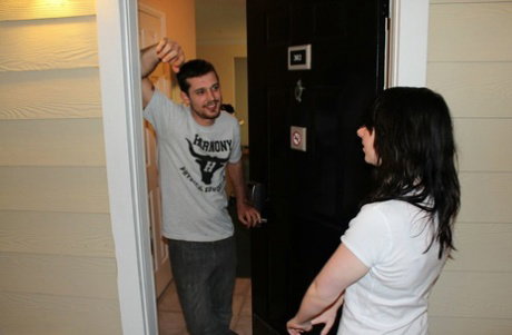 Dark haired teen Dakota jerks off her stepbrother while fully clothed