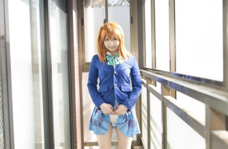 Flame-haired Asian girl Ai Misaki gets creampied in a wild gangbang