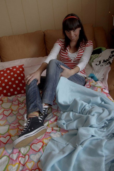 European teen babe Era fingers her booty and toys her vagina in the bed