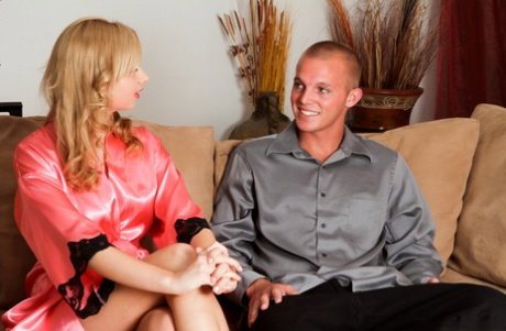 Blonde masseuse Molly Bennett doffs a satin robe during a happy ending massage