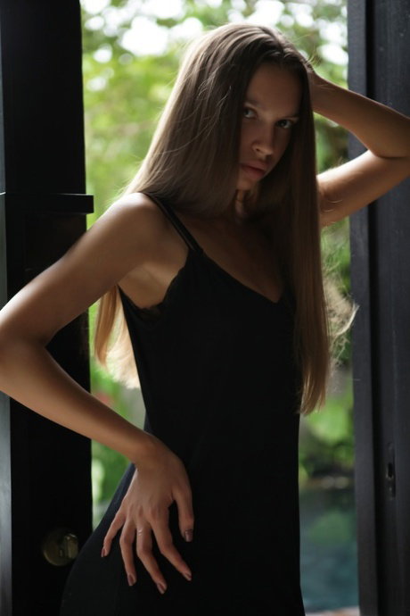 Glamorous teen babe Elin strips down naked & shows her amazing big tits