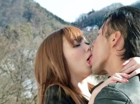 Japanese redhead Buruma Aoi engages in a spirited fuck with her man friend