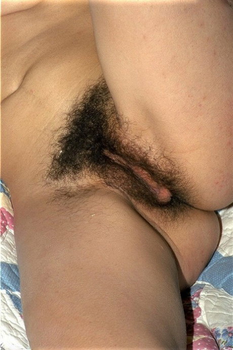 Amateur slant-eyed model Amanda shows hair all over her naked body