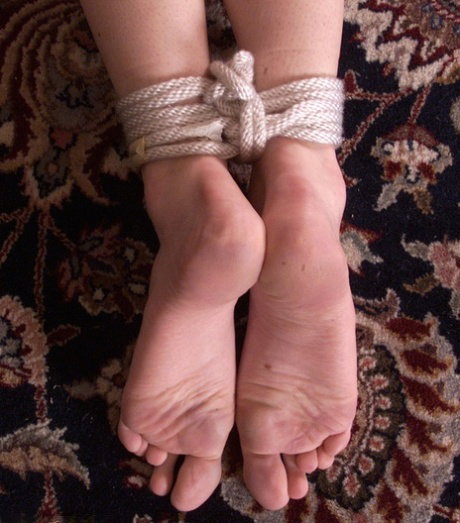 Petite girl Ashley gets tied up for a hard BDSM spanking & ass flogging