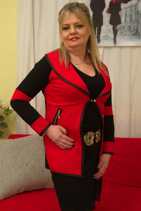 Thick older blonde Bella S partakes in foreplay with her younger lover