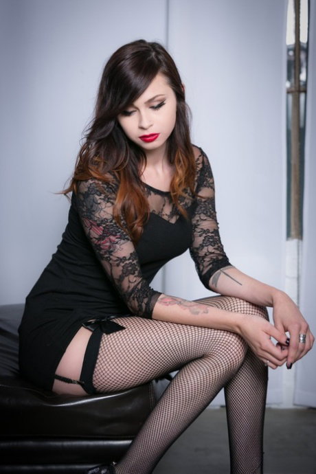 Erotic teen Vera Drake gives sultry striptease to spread pussy in stockings