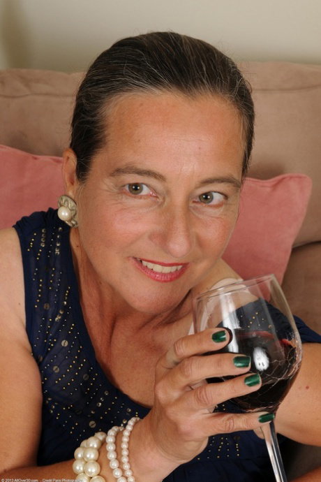 Sexy aunty Nicola gets drunk before exposing her big ass and hairy pussy