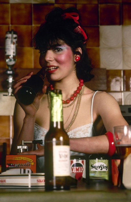 Brunette bartender Emilie gets double fucked by a couple of her customers
