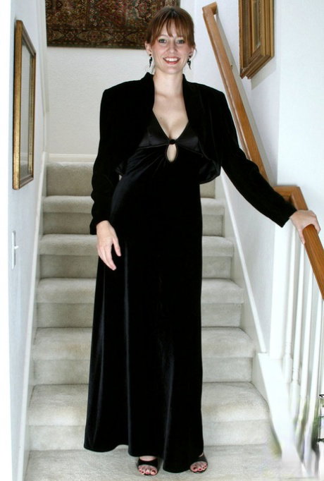 Classy mature lady Justine plays with her wide open pussy on staircase