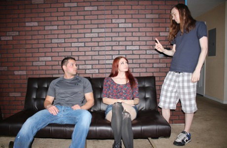 Redheaded teen Conner seduces her stepbrother and gives him a handjob