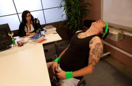 Nerdy office worker Vyxen Steel gets ass fucked during sex with a tattooed man