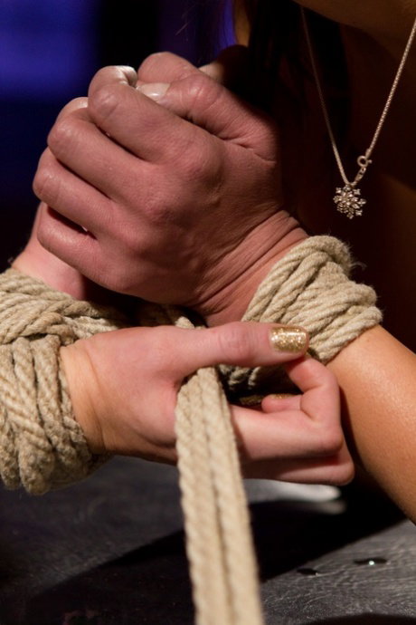 Two slavic lesbians are subjected to electric shocks while restrained in bondage