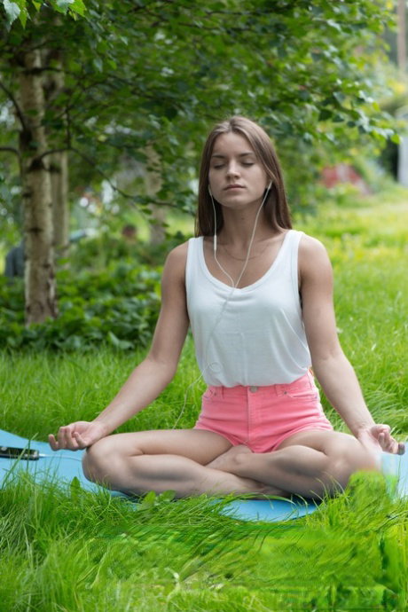 Thin Russian teen Evelina Darling undress after doing yoga in the woods