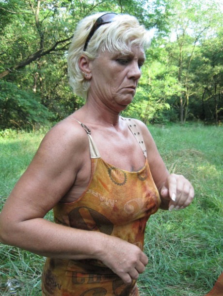 Amateur granny Paulene shows off her pussy & boobs outdoors in the grass