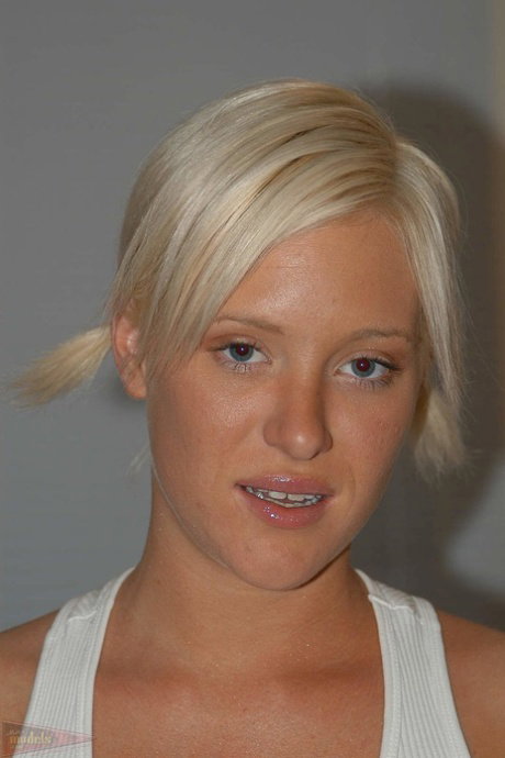 Blonde first timer Summer uncovers her nice tits before parting her tight twat