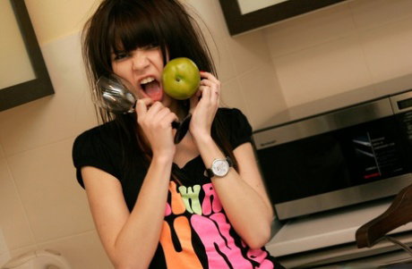Solo girl Kaira 18 bares her teenie titties before peeking thru kitchen blinds