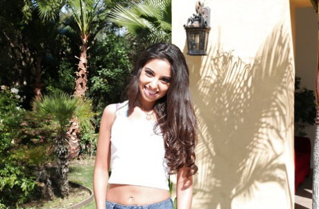 Skinny latina sweetie Trinity St. Clair undressing outdoor