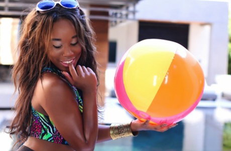 Sexy ebony girl Ashley Pink shows her bare ass and slit in funky sunglasses