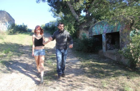 European redhead Lilyan Red gives a blowjob and gets fucked outdoors