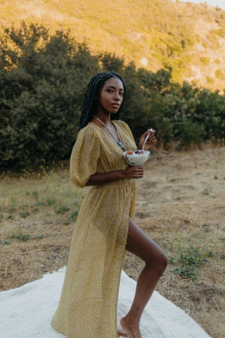Glamorous ebony babe Sarissle strips & flaunt her absolutely perfect body